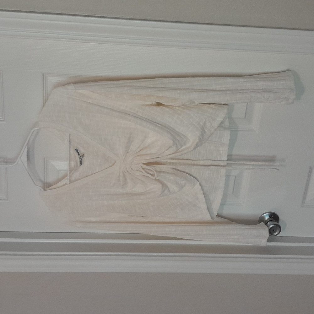 Light weight cream sweater with adjustable front